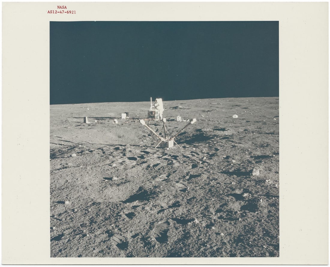 [Apollo 12] PETE CONRAD DEPLOYING THE FIRST SCIENTIFIC SITE ON THE OCEAN OF STORMS (1 of 2)