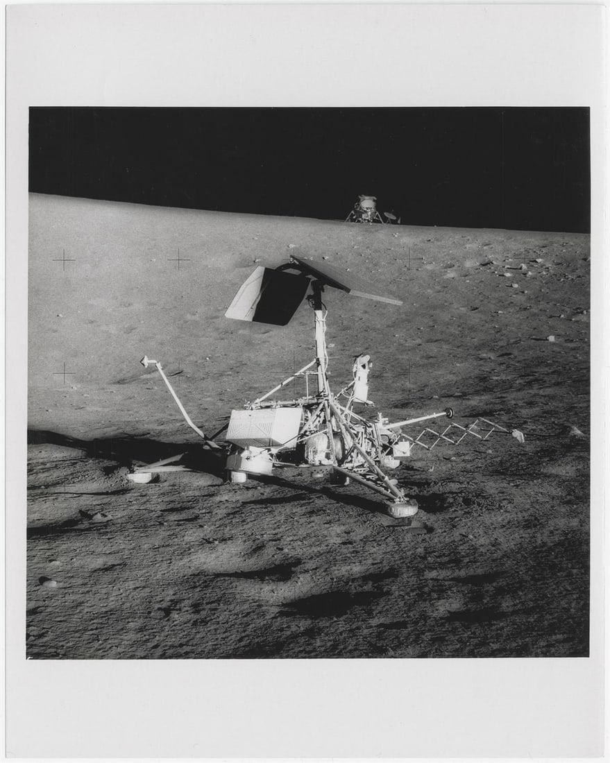 [Apollo 12] ROBOT PROBE SURVEYOR III AND LUNAR MODULE INTREPID ON THE OCEAN OF STORMS (1 of 2)