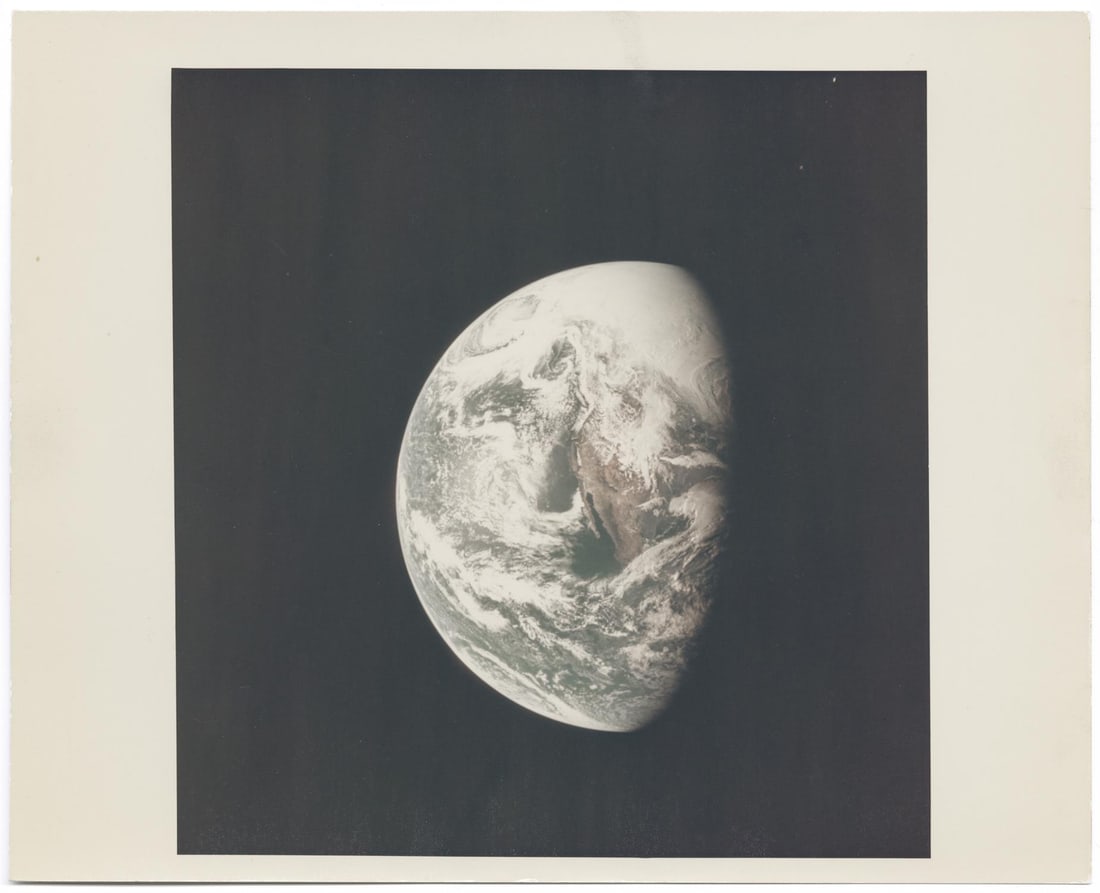 [Apollo 13] EARTH, A MARBLE OF BLUE AND WHITE, CAPTURED DURING MOON-BOUND FLIGHT (1 of 2)
