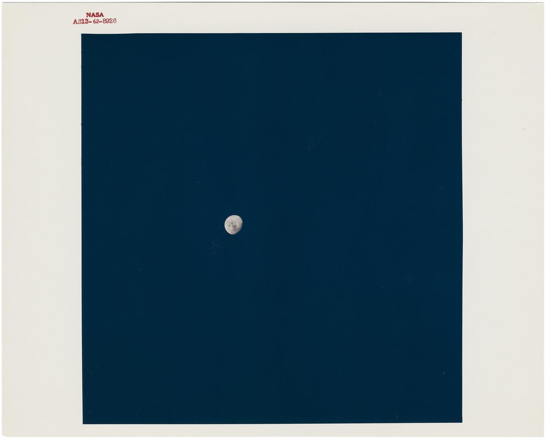 [Apollo 13] MOON VANISHES INTO DARKNESS AMID APOLLO 13'S HARROWING JOURNEY HOME: [Apollo 13] MOON VANISHES INTO DARKNESS AMID APOLLO 13'S HARROWING JOURNEY HOMEJack Swigert or Fred Haise, 11-17 April 1970 Printed 1970.Vintage chromogenic print on fibre-based Kodak paper.With A Kod