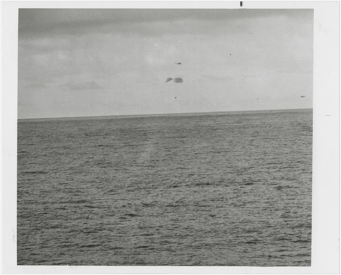 [Apollo 13] THE CREW PARACHUTING SAFELY TO THE PACIFIC OCEAN AFTER A HARROWING MISSION (1 of 3)