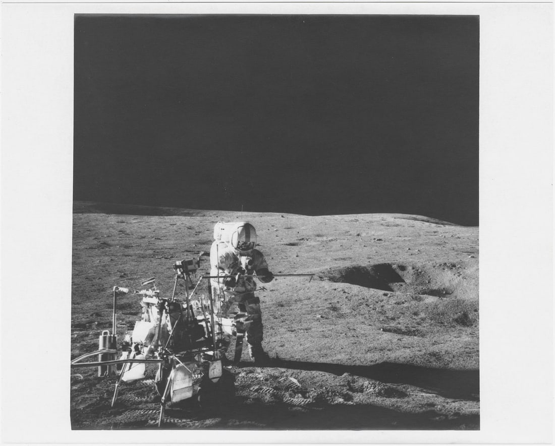 [Apollo 14] NATIONAL GEOGRAPHIC COVER: ALAN SHEPARD DURING A GEOLOGICAL FIELD TRIP TO CONE CRATER (1 of 4)