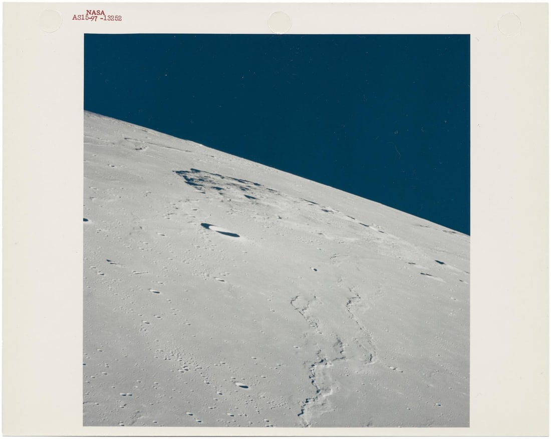 [Apollo 15] LUNAR HORIZON OVER MONS RÜMKER: [Apollo 15] LUNAR HORIZON OVER MONS RÜMKERAlfred Worden, James Irwin, or David Scott, 26 July - 7 August 1971 Printed 1971.Vintage chromogenic print on fibre-based paper.With A Kodak Paper watermark
