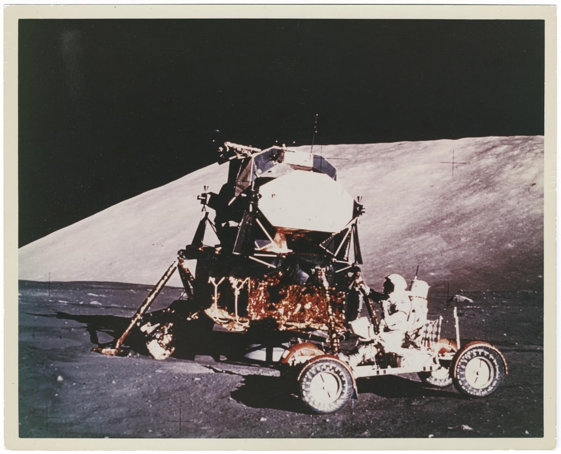 [Apollo 17] EUGENE CERNAN TAKING THE LAST LUNAR ROVER AT TAURUS LITTROW FOR A SPIN (1 of 2)