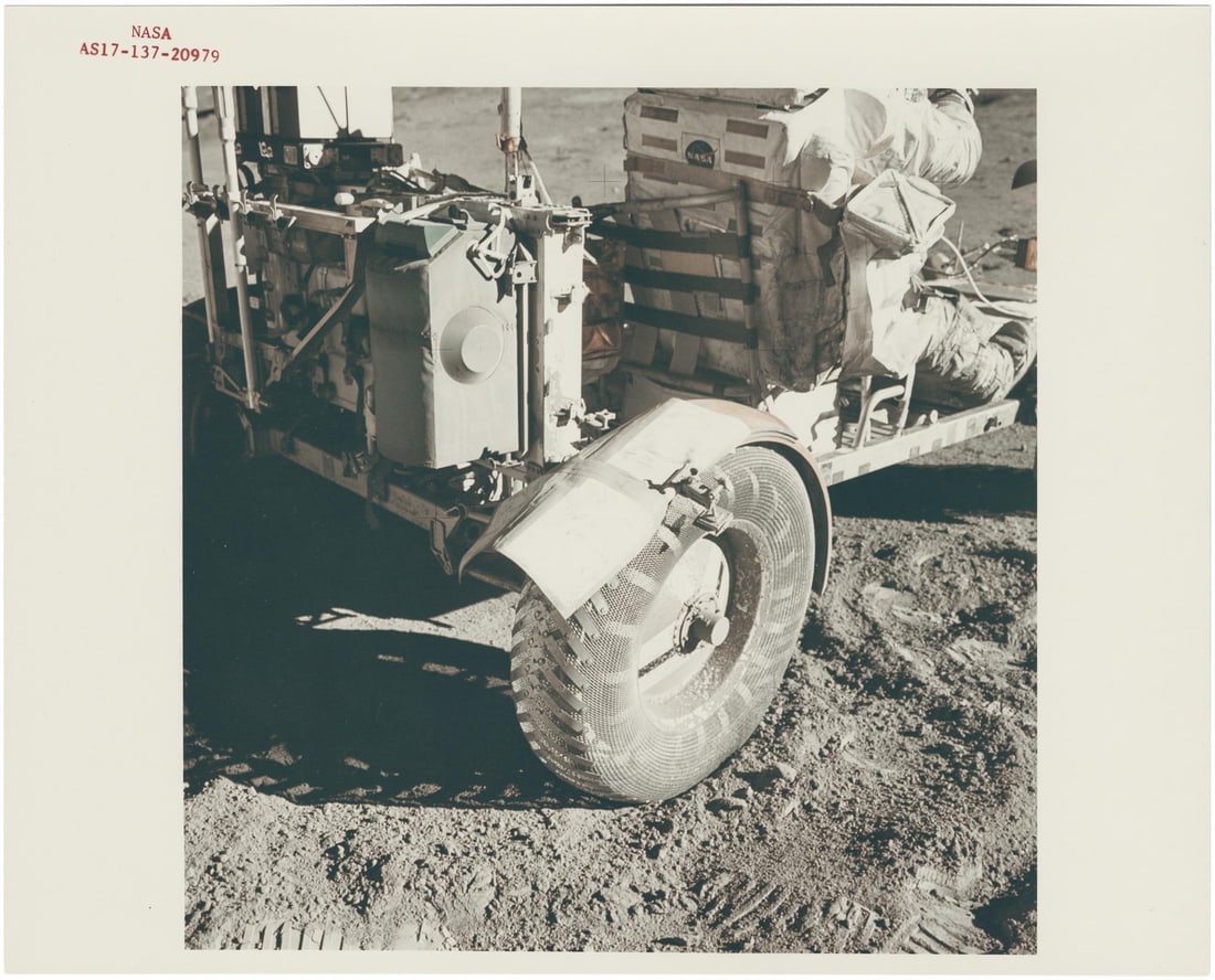 [Apollo 17] HARRISON SCHMITT SEATED IN THE REPAIRED LUNAR ROVER AT NANSEN CRATER, STATION 2 (1 of 3)