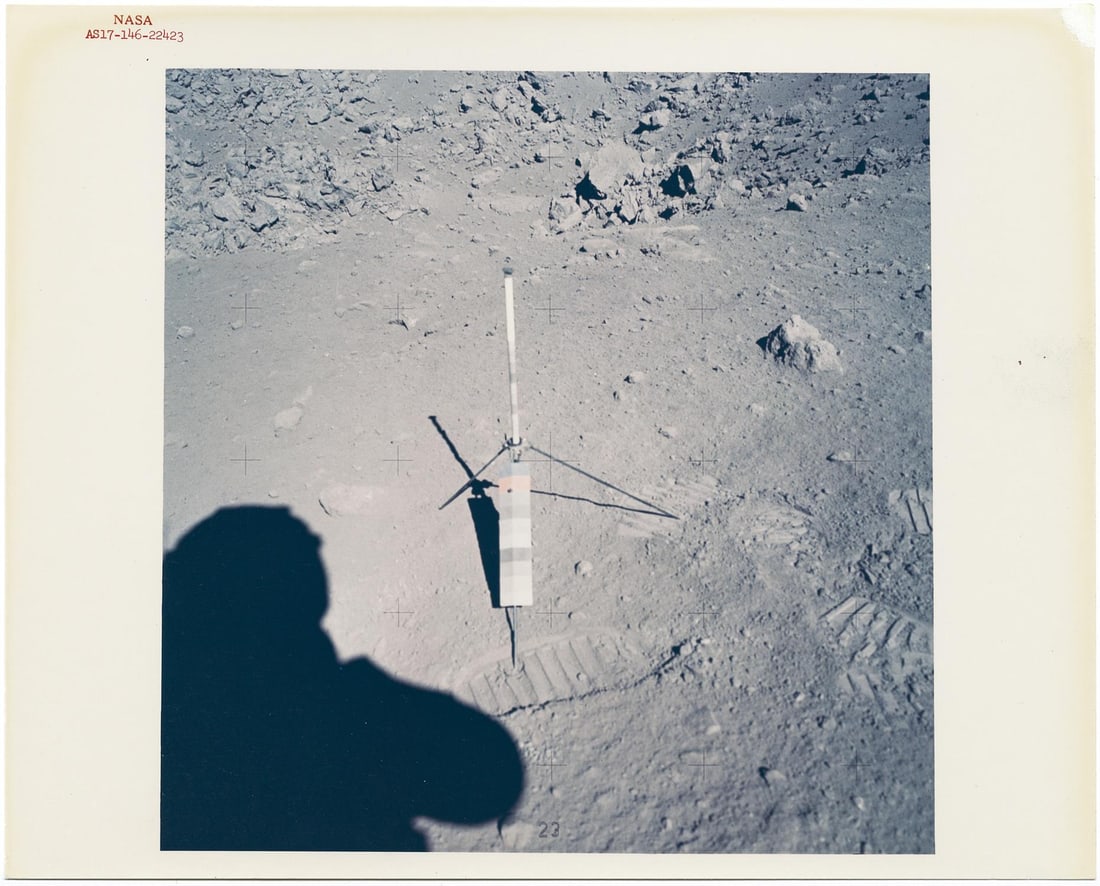[Apollo 17] FOOTPRINTS AND ROCKS AT THE LAST STATION EXPLORED ON THE LUNAR SURFACE, STATION 9 (1 of 2)