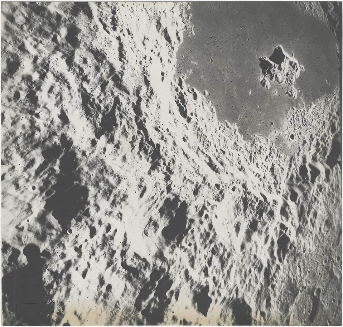 [Apollo 17] STRIKING VIEW OF CRATER TSIOLKOVSKY (1 of 2)