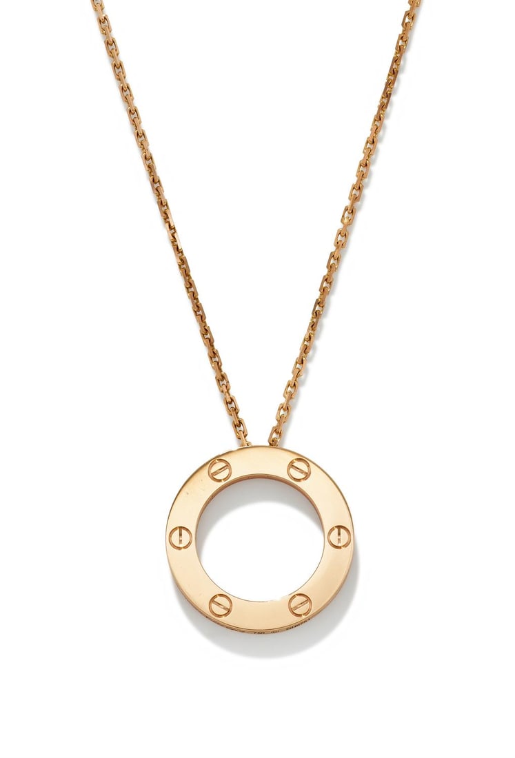 CARTIER, A 'LOVE' PENDANT: CARTIER, A 'LOVE' PENDANTThe circlet with six screw head motifs to one side and the word LOVE to the other, suspended from an 18ct rose gold filed link chain, pendant signed Cartier, numbered GH6751,