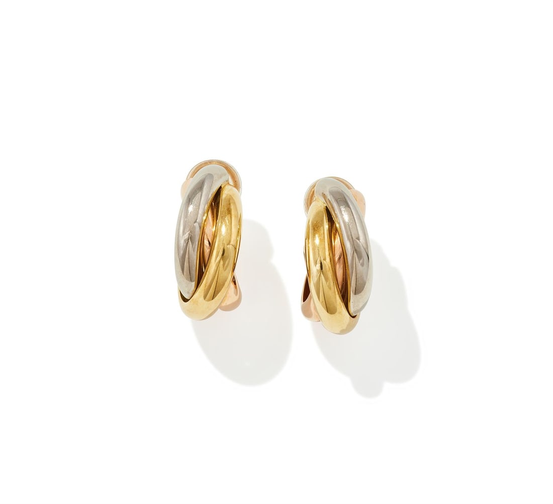 CARTIER, A PAIR OF 'TRINITY' EARRINGS: CARTIER, A PAIR OF 'TRINITY' EARRINGSEach of tri-coloured hoop design, clip fittings, signed Cartier, numbered B50210, stamped 750, with an associated Cartier case, with certificate of authenticitySiz