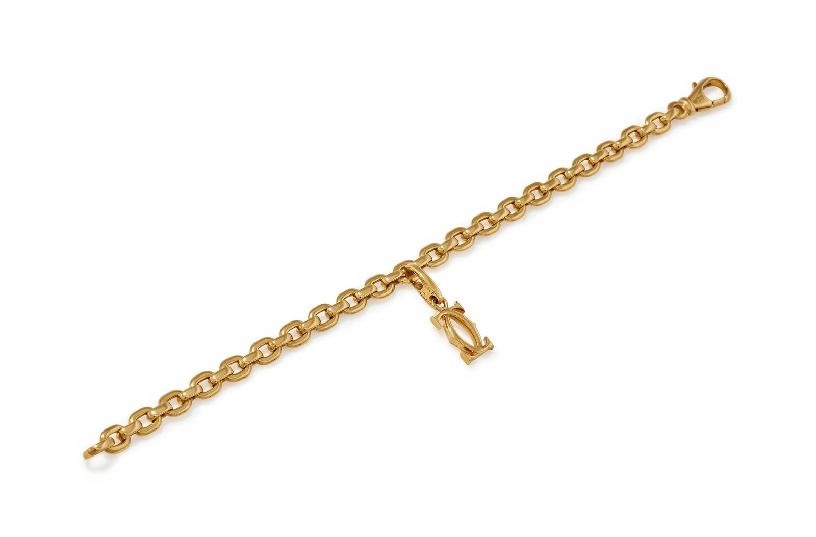 CARTIER, A 'MEPLAT' BRACELET WITH 'DOUBLE C' CHARM: CARTIER, A 'MEPLAT' BRACELET WITH 'DOUBLE C' CHARM The flattened link bracelet, with lobster claw clasp, suspending a detachable charm of interlocked C design, each signed Cartier, maker's mark,