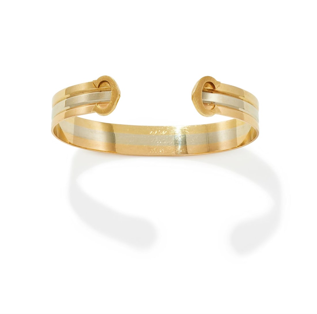 CARTIER, A 'C DE CARTIER' BANGLE (1 of 3)