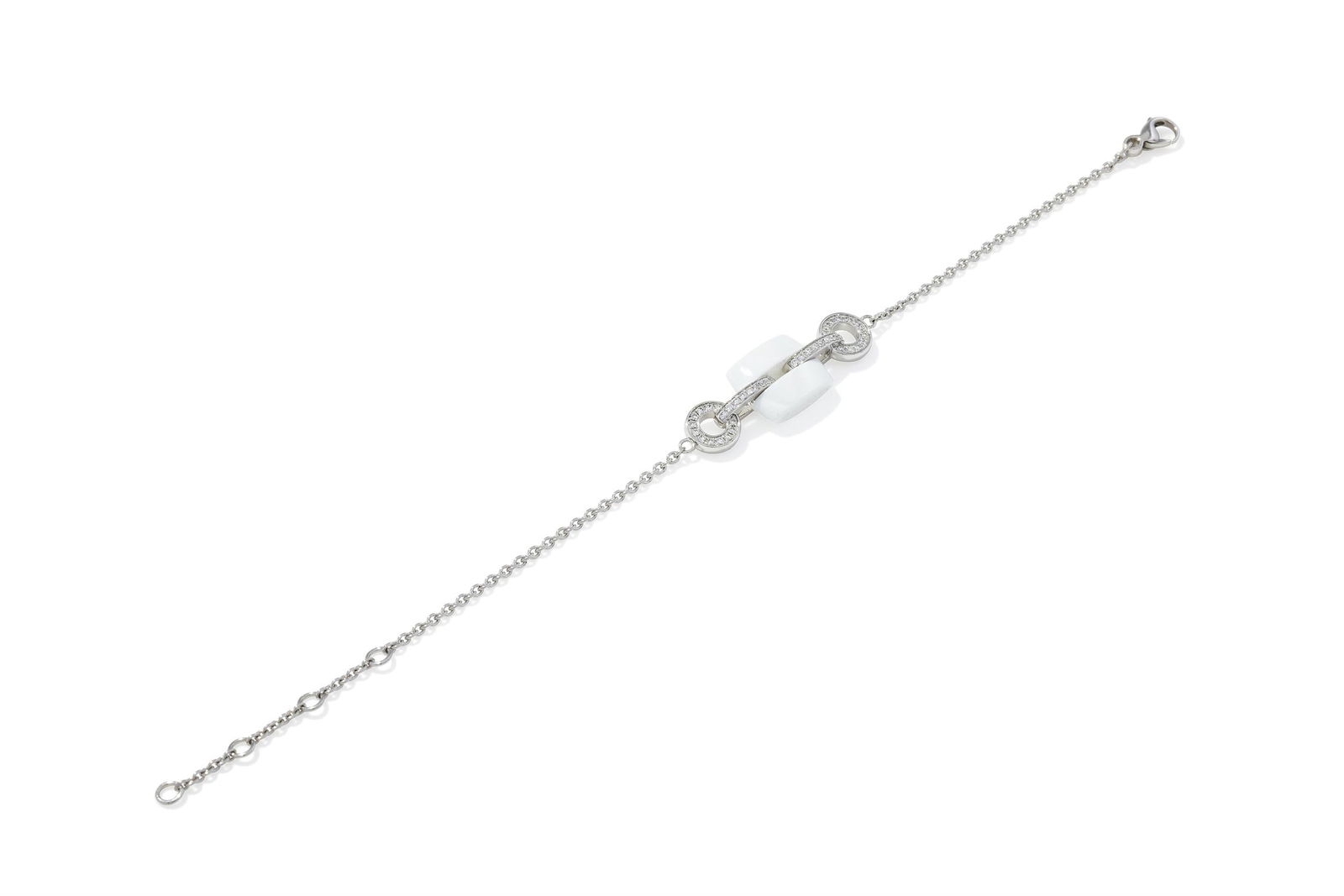 CHANEL, A DIAMOND AND WHITE CERAMIC 'ULTRA' BRACELET (1 of 3)