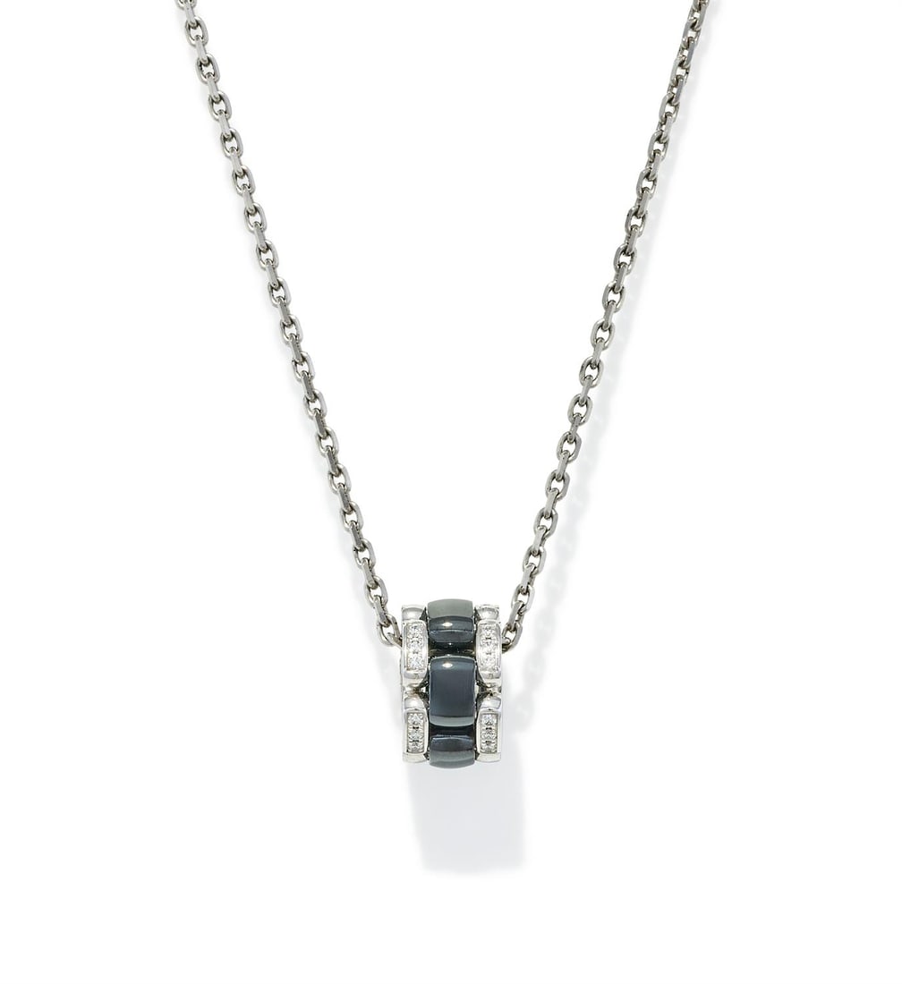 CHANEL, AN 'ULTRA' DIAMOND AND BLACK CERAMIC PENDANT NECKLACE (1 of 3)