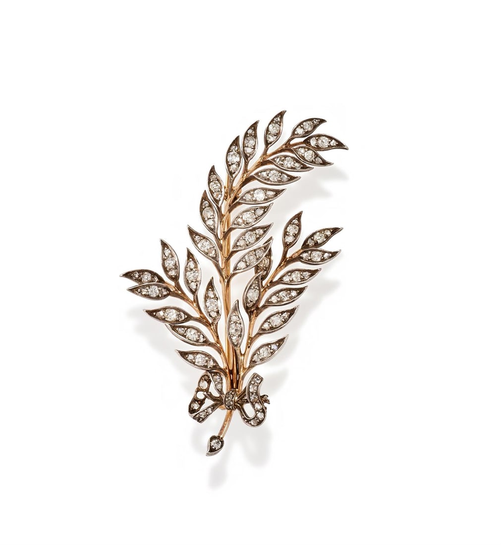 A LATE 19TH CENTURY DIAMOND SPRAY BROOCH: A LATE 19TH CENTURY DIAMOND SPRAY BROOCH Designed as three ears of wheat tied with a bow, set throughout with old European and rose cut diamonds, mounted in silver and gold, unmarked Size/dimensions:
