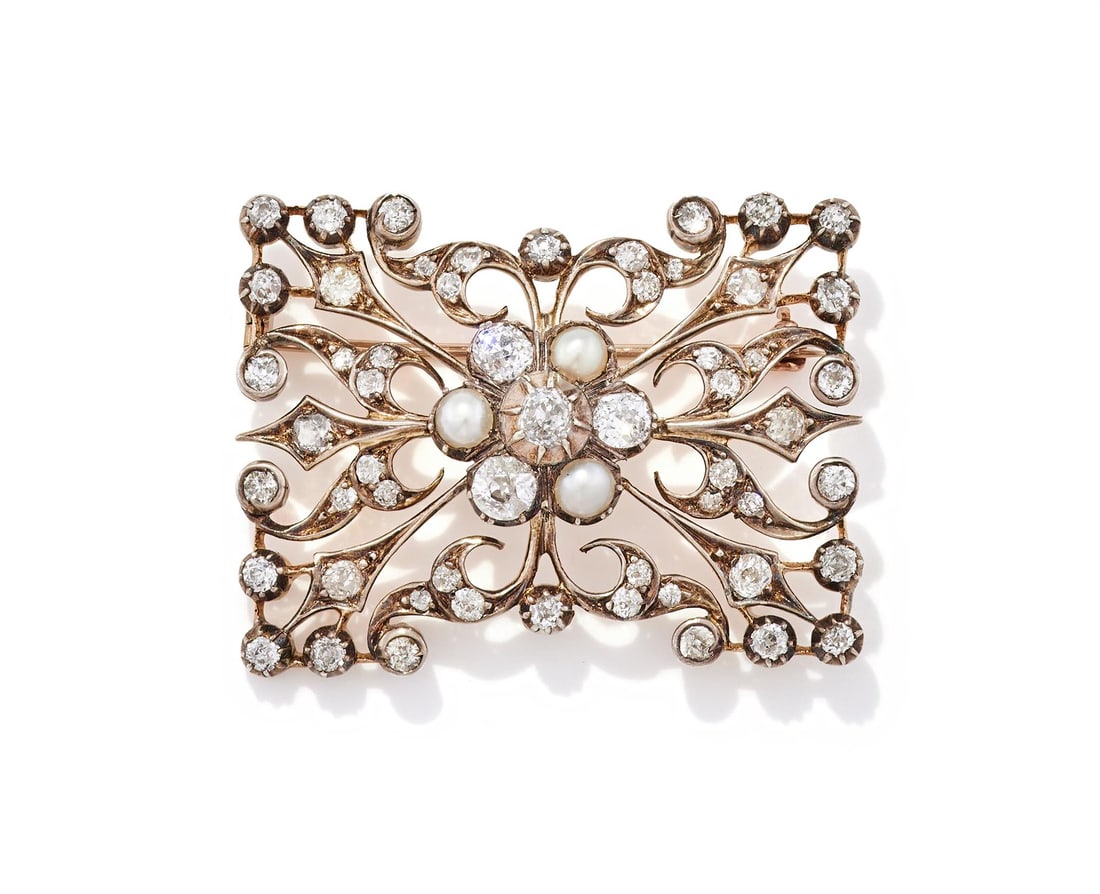 A LATE 19TH/EARLY 20TH CENTURY DIAMOND AND HALF PEARL BROOCH (1 of 2)