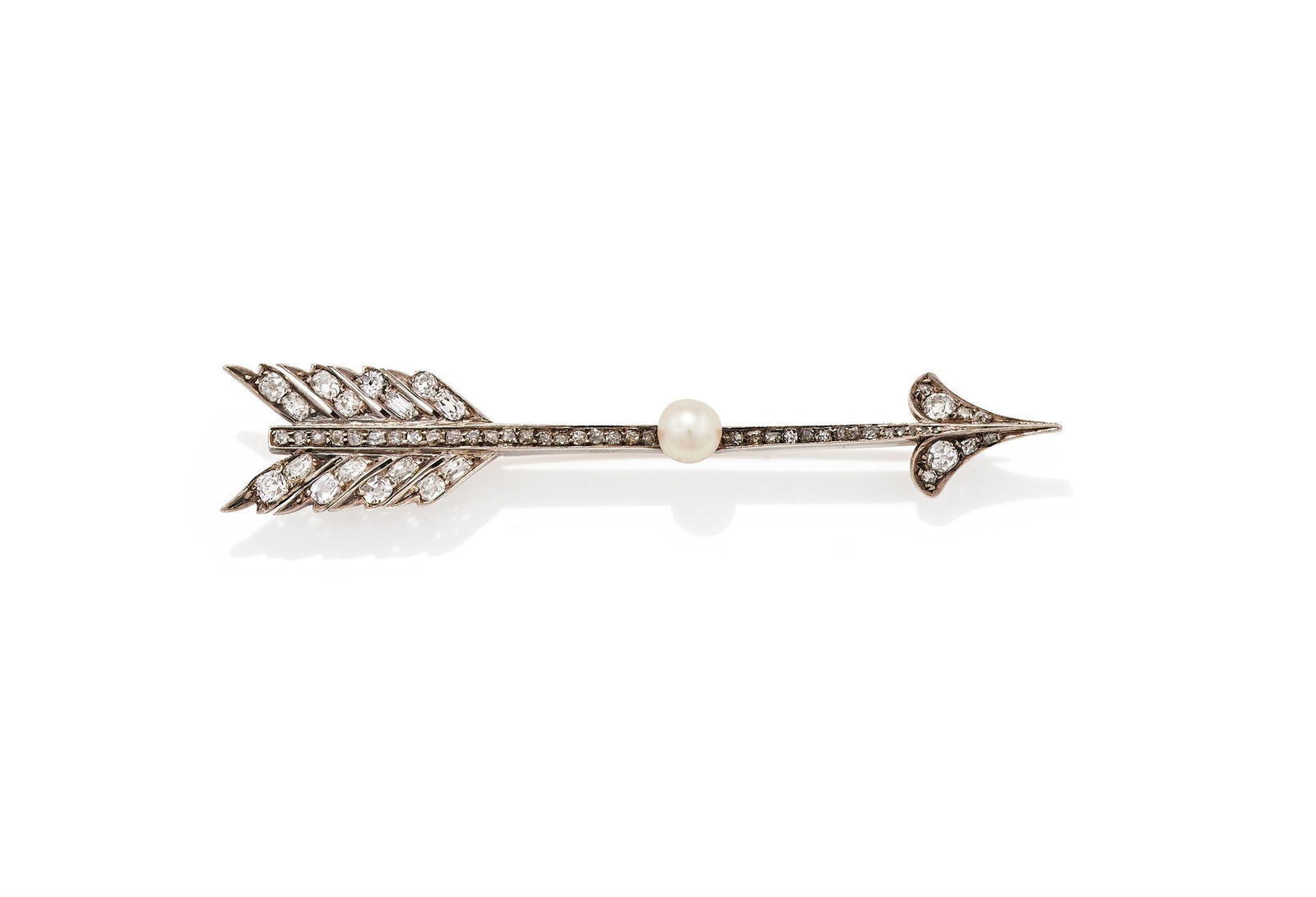 A DIAMOND AND PEARL ARROW BROOCH: A DIAMOND AND PEARL ARROW BROOCHLATE 19TH CENTURY AND LATERThe arrow set throughout with old mine and old European cut diamonds, with a central pearl accent, unmarked, in a fitted red leather case 