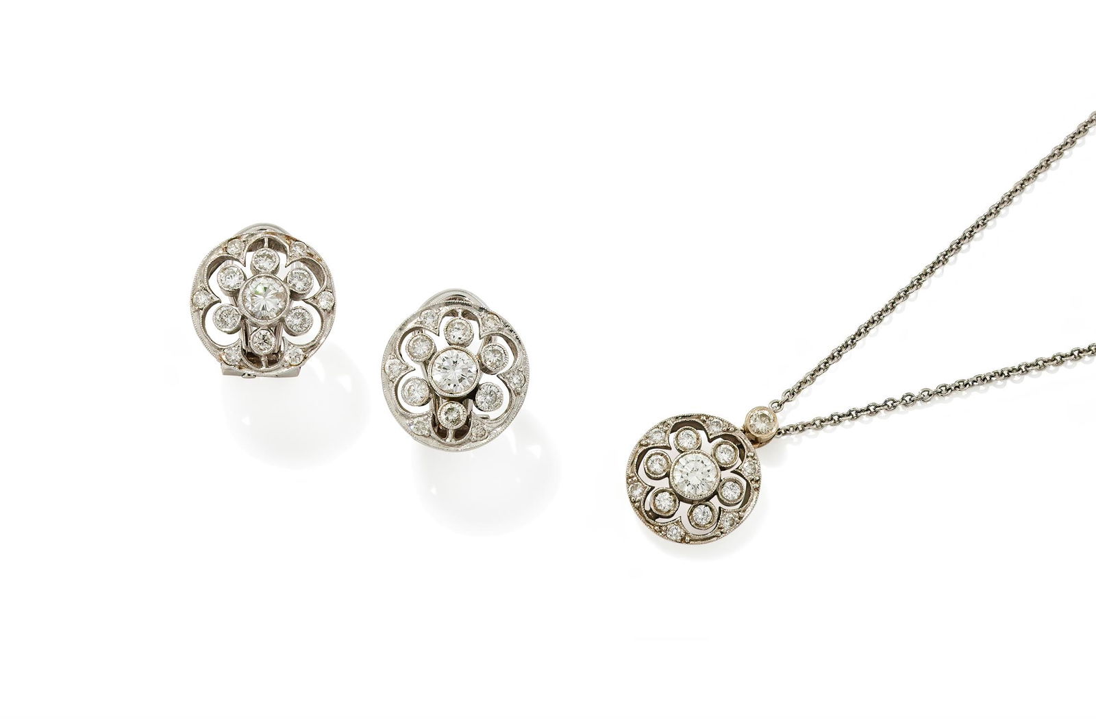 A DIAMOND PENDANT AND PAIR OF EARRINGS (1 of 3)
