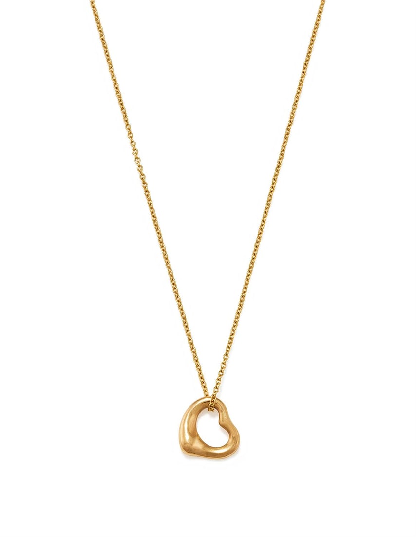ELSA PERETTI FOR TIFFANY & CO., AN 'OPEN HEART' PENDANT: ELSA PERETTI FOR TIFFANY & CO., AN 'OPEN HEART' PENDANT The polished heart suspended from a fine trace link chain, signed Tiffany & Co., Elsa Peretti and stamped 750 SpainSize/dimensions: pendant 1.1c