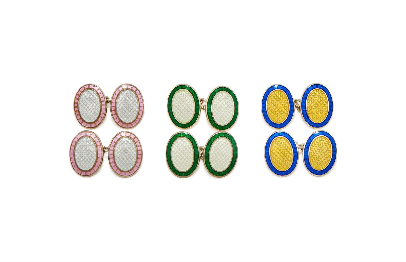 DEAKIN & FRANCIS, THREE PAIRS OF SILVER AND ENAMEL DOUBLE SIDED OVAL CUFFLINKS: DEAKIN & FRANCIS, THREE PAIRS OF SILVER AND ENAMEL DOUBLE SIDED OVAL CUFFLINKSCOMPRISING:A pair of grey and pink enamel cufflinks, Birmingham 2000A pair of white and green enamel cufflinks, Birmingham