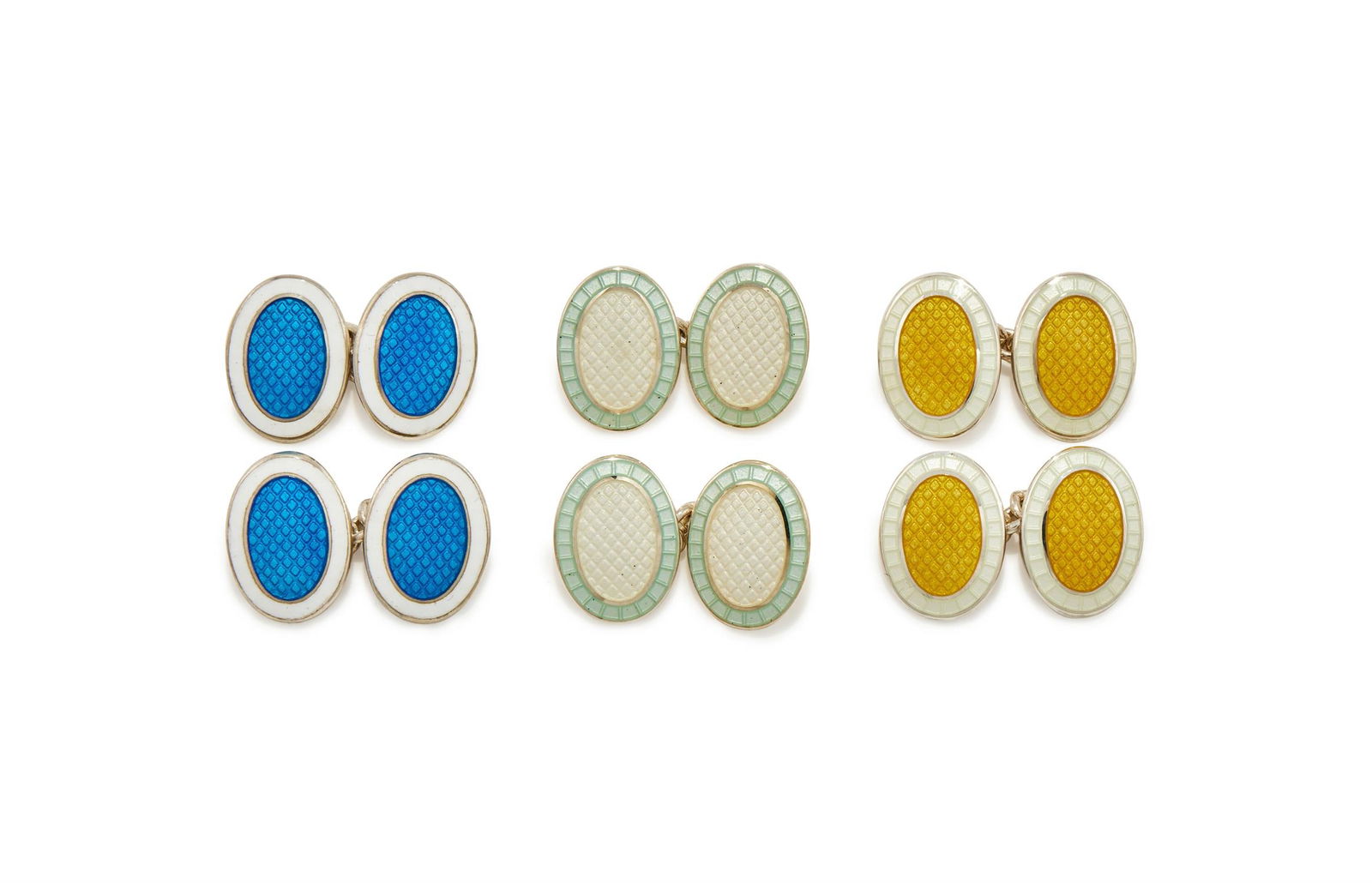 DEAKIN & FRANCIS, THREE PAIRS OF SILVER AND ENAMEL DOUBLE SIDED OVAL CUFFLINKS: DEAKIN & FRANCIS, THREE PAIRS OF SILVER AND ENAMEL DOUBLE SIDED OVAL CUFFLINKSCOMPRISING:A pair of blue and white enamel cufflinks, Birmingham 2006A pair of yellow and white enamel cufflinks, Birmingh