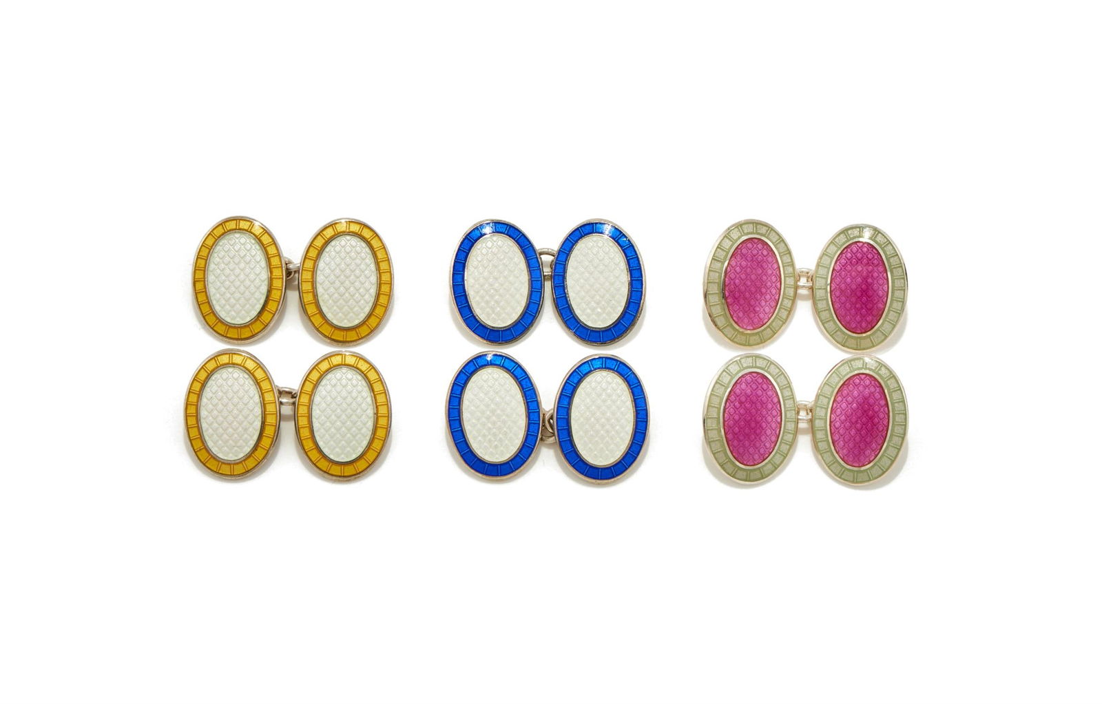 DEAKIN & FRANCIS, THREE PAIRS OF SILVER AND ENAMEL DOUBLE SIDED OVAL CUFFLINKS: DEAKIN & FRANCIS, THREE PAIRS OF SILVER AND ENAMEL DOUBLE SIDED OVAL CUFFLINKSCOMPRISING:A pair of white and blue enamel cufflinks, Birmingham 1998A pair of white and yellow enamel cufflinks, Birmingh