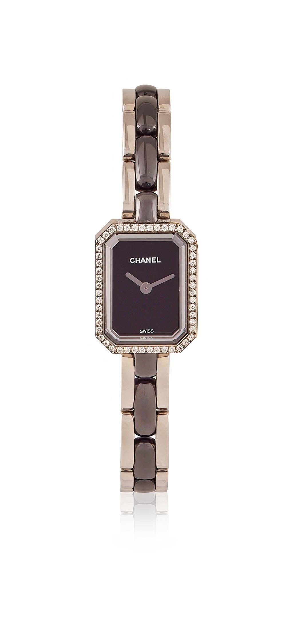 CHANEL, COLLECTION PREMIÉRE, REF. H2163, A LADY'S STAINLESS STEEL, BLACK CERAMIC AND DIAMOND: CHANEL, COLLECTION PREMIÉRE, REF. H2163A LADY'S STAINLESS STEEL, BLACK CERAMIC AND DIAMOND BRACELET WATCH, O.M. 74075, CIRCA 2011Movement: Cal. ETA E01 701, quartz, 5 jewelsCase: Stainless steel