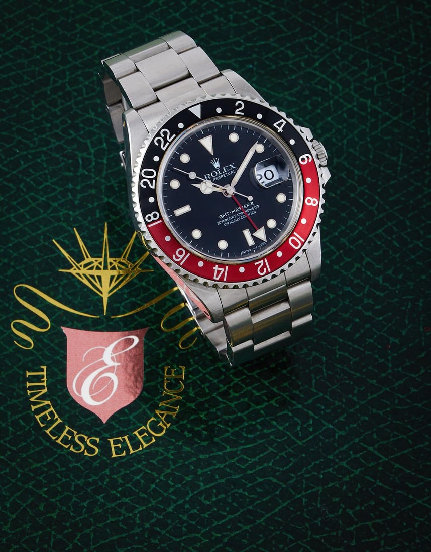 ROLEX, GMT-MASTER II, REF. 16710, A STAINLESS STEEL BRACELET WATCH WITH DUAL TIME ZONE: ROLEX, OYSTER PERPETUAL GMT-MASTER II, REF. 16710A STAINLESS STEEL BRACELET WATCH WITH DUAL TIME ZONE AND DATE, NO. L606508, CIRCA 1989Movement: Cal. 3185, automatic, 31 jewels Case: Stainless steel c