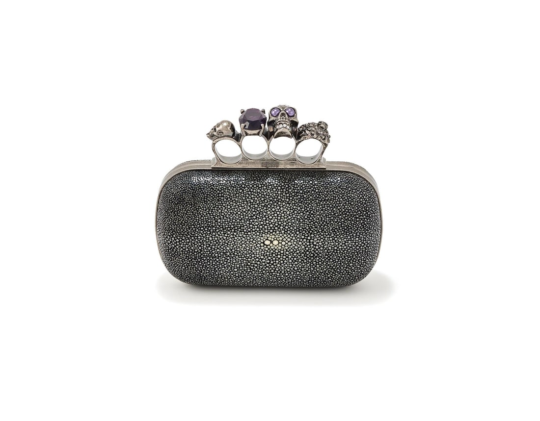 ALEXANDER MCQUEEN, KNUCKLE CLUTCH, A SHAGREEN CLUTCH BAG: ALEXANDER MCQUEEN, KNUCKLE CLUTCHA SHAGREEN CLUTCH BAG, NO. 208024 000926With a white metal knuckle duster clasp, applied and chased with skulls inset with pastes, opening to a red leather
