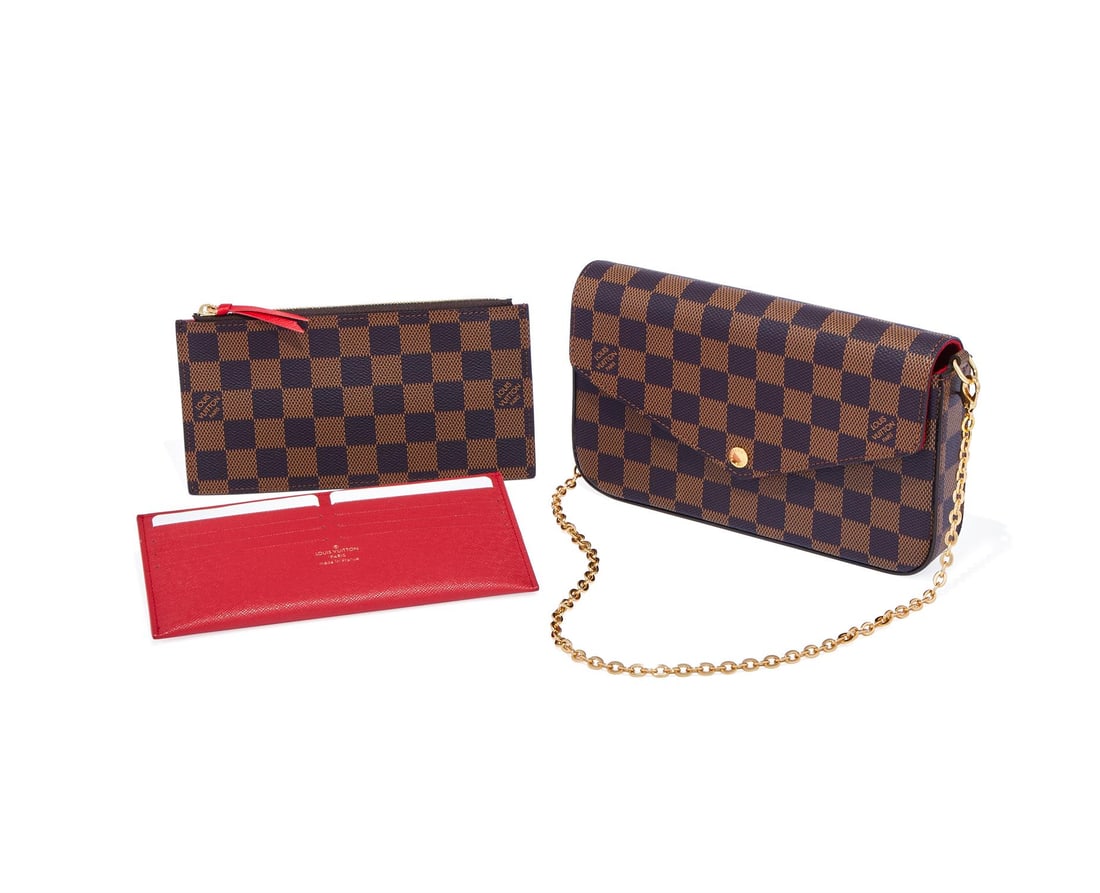LOUIS VUITTON, FELICIE POCHETTE, A DAMIER EBENE BAG: LOUIS VUITTON, FELICIE POCHETTEA DAMIER EBENE BAGWith red suede interior and gilt shoulder strapAccessories: Louis Vuitton card box and dust bagDimensions: 22 x 12.7 x 3.5cmTogether With:LOUIS