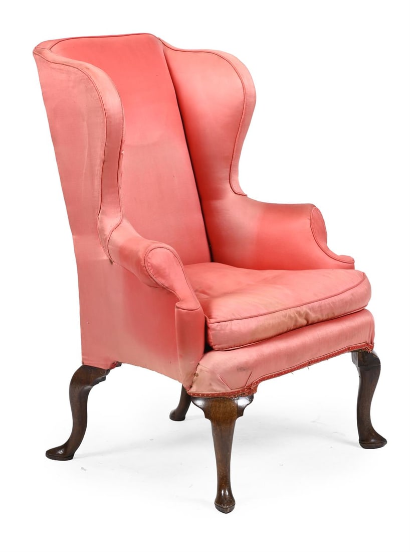 A QUEEN ANNE WALNUT AND UPHOLSTERED WING ARMCHAIR, CIRCA 1710 (1 of 3)