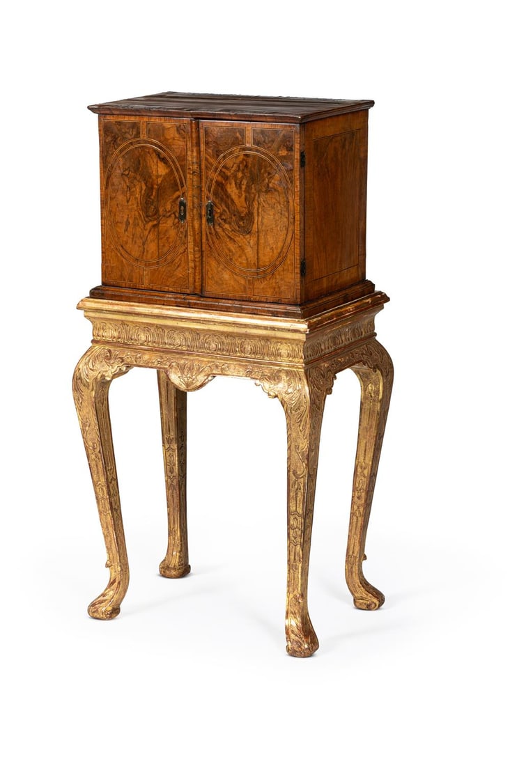 A GEORGE I FIGURED WALNUT AND CROSSBANDED CABINET, CIRCA 1720 (1 of 4)