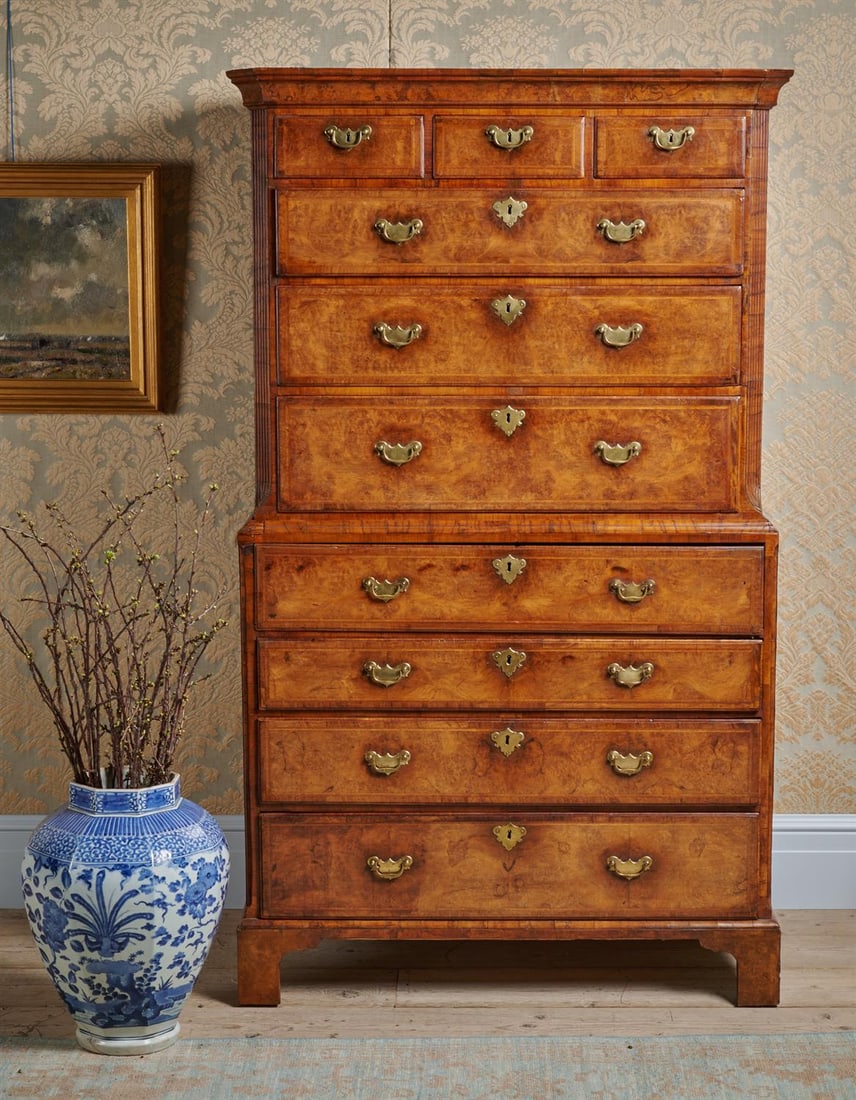 A GEORGE II BURR WALNUT AND FEATHERBANDED SECRETAIRE CHEST ON CHEST, CIRCA 1730 (1 of 6)