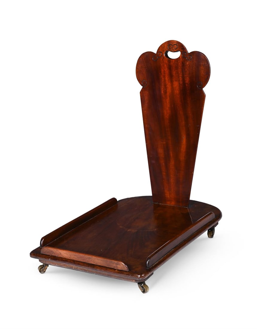 AN UNUSUAL GEORGE III MAHOGANY LIBRARY BOOK TROLLEY, CIRCA 1810 (1 of 3)