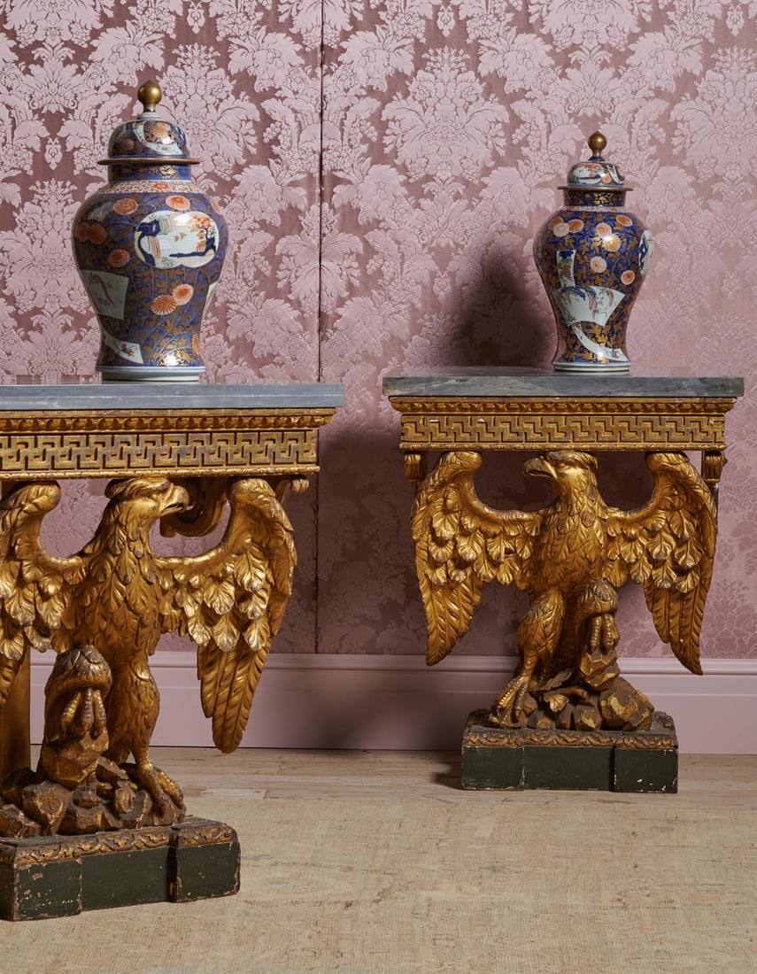 A PAIR OF CARVED GILTWOOD AND MARBLE TOPPED EAGLE CONSOLE TABLES, IN THE MANNER OF WILLIAM KENT (1 of 10)