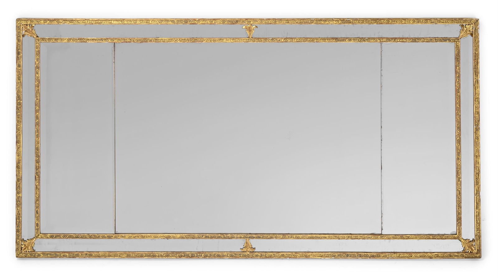 A GEORGE III CARVED GILTWOOD AND GESSO MIRROR, CIRCA 1810: A GEORGE III CARVED GILTWOOD AND GESSO MIRRORCIRCA 1810The triple plates within bevelled margins79.5cm high, 153.5cm wide, 4cm deep