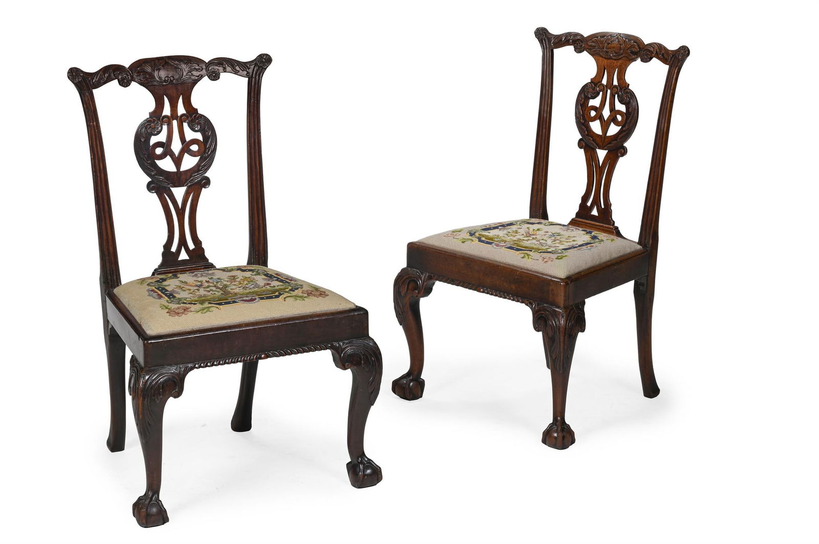 A PAIR OF GEORGE III CARVED MAHOGANY CHAIRS, CIRCA 1760 (1 of 3)