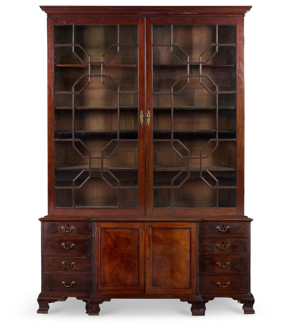 A GEORGE III MAHOGANY BREAKFRONT BOOKCASE, PROBABLY IRISH, CIRCA 1770 (1 of 3)