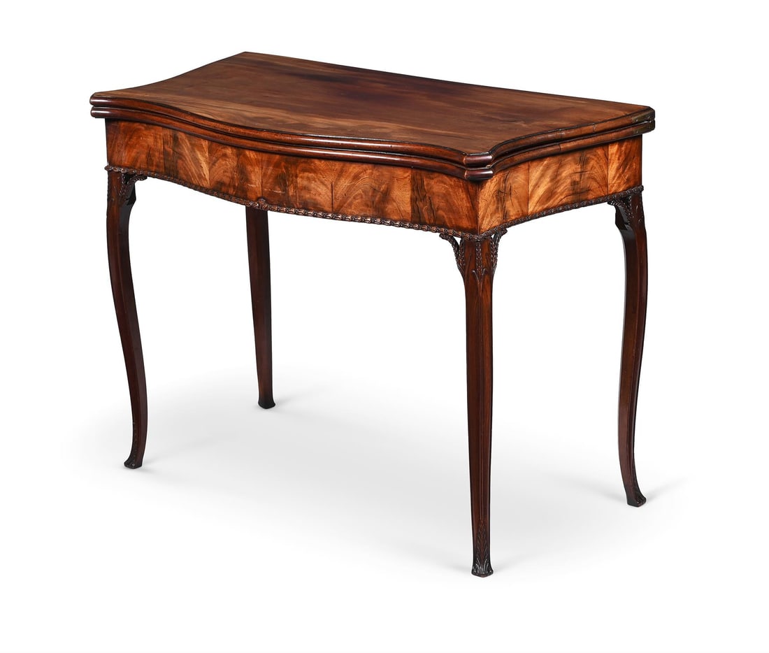 AN UNUSUAL GEORGE III MAHOGANY FOLDING CARD TABLE, CIRCA 1770 (1 of 3)