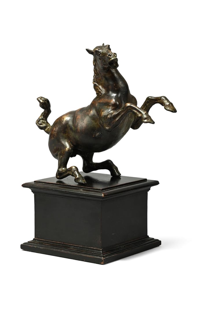 AFTER THE MODEL BY LEONARDO DA VINCI (ITALIAN, 1452-1519), A BRONZE MODEL OF A REARING HORSE: AFTER THE MODEL BY LEONARDO DA VINCI (ITALIAN, 1452-1519), A BRONZE MODEL OF A REARING HORSE POSSIBLY 19TH CENTURY Set on a moulded ebonised base the bronze 19cm high, 30cm high overall, the base 15.5