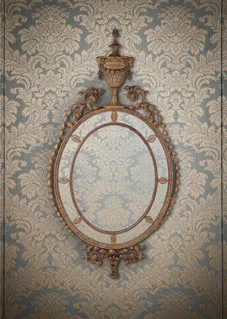 A LARGE GEORGE III CARVED GILTWOOD MIRROR, AFTER DESIGNS BY ROBERT ADAM, CIRCA 1780 (1 of 5)