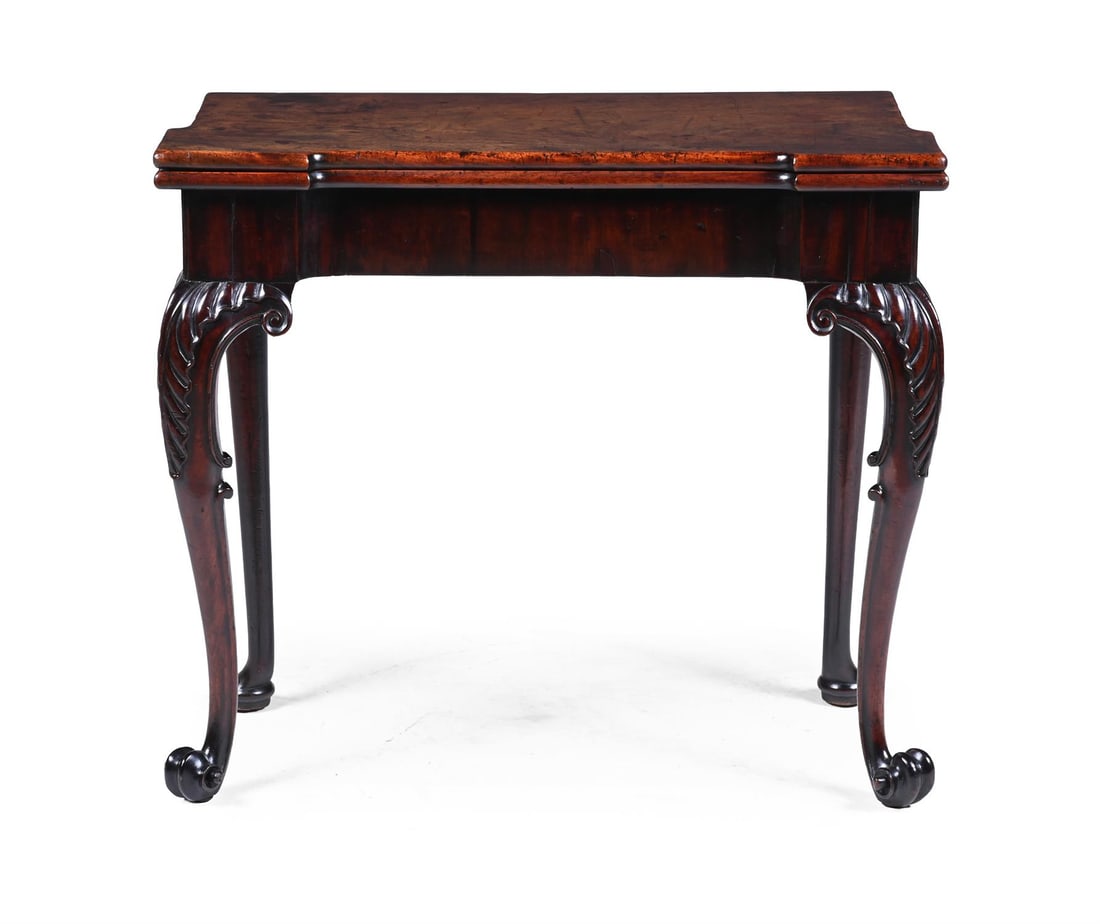 A GEORGE III MAHOGANY FOLDING CARD TABLE, IN THE MANNER OF PAUL SAUNDERS, CIRCA 1760 (1 of 5)
