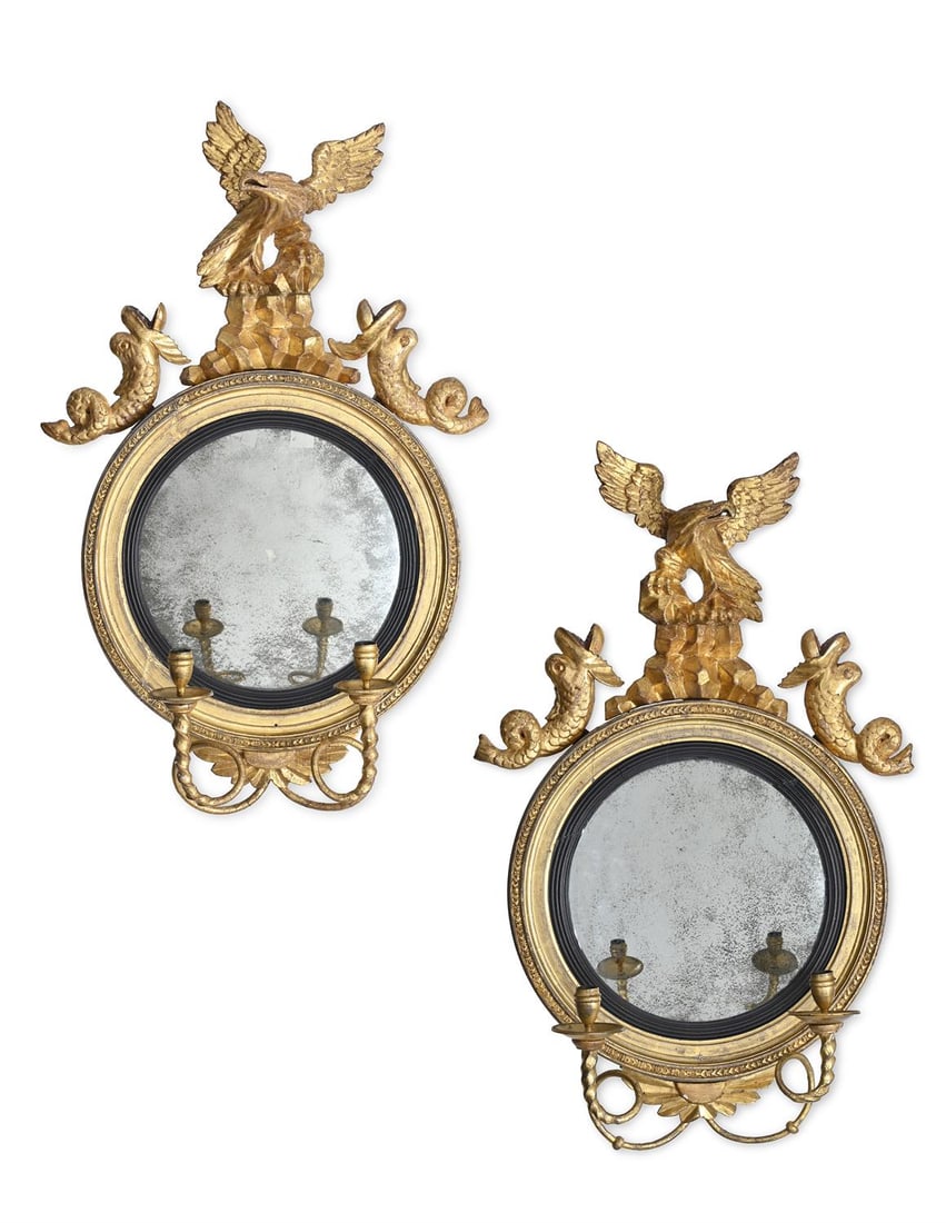 A PAIR OF REGENCY CARVED GILTWOOD GIRANDOLE CONVEX MIRRORS, CIRCA 1815: A PAIR OF REGENCY CARVED GILTWOOD GIRANDOLE CONVEX MIRRORSCIRCA 181578cm high, 49cm wide