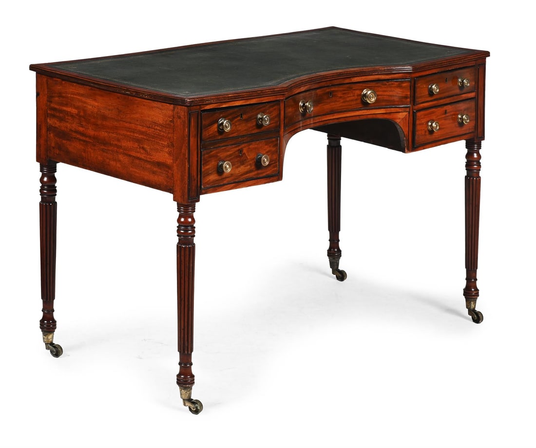 A REGENCY MAHOGANY WRITING DESK OR DRESSING TABLE, IN THE MANNER OF GILLOWS, CIRCA 1815 (1 of 3)