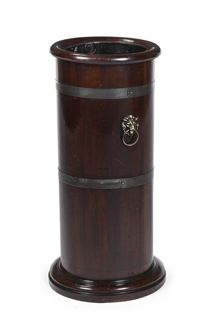 A WILLIAM IV MAHOGANY AND METAL BOUND CYLINDRICAL STICK STAND, CIRCA 1835 (1 of 3)