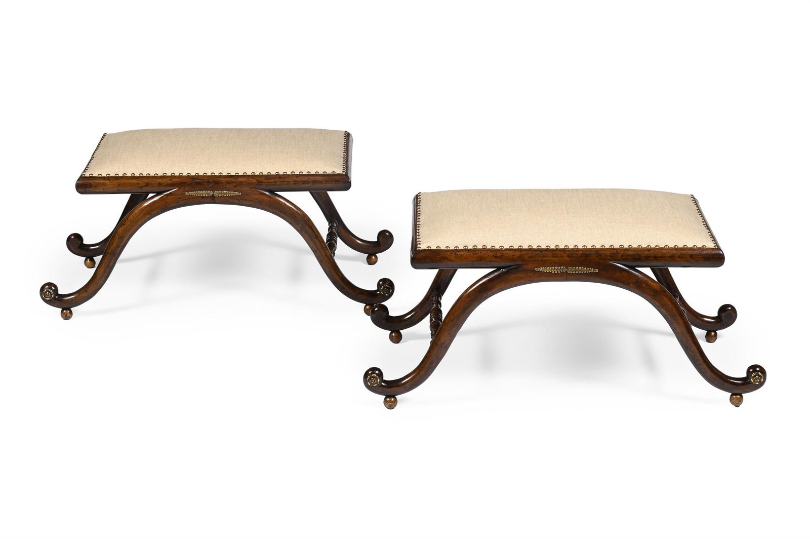 A PAIR OF REGENCY BEECH AND BRASS MOUNTED X FRAME STOOLS, ATTRIBUTED TO GILLOWS, CIRCA 1820: A PAIR OF REGENCY BEECH AND BRASS MOUNTED X FRAME STOOLSATTRIBUTED TO GILLOWS, CIRCA 182040cm high, 89cm wide, 45cm deep