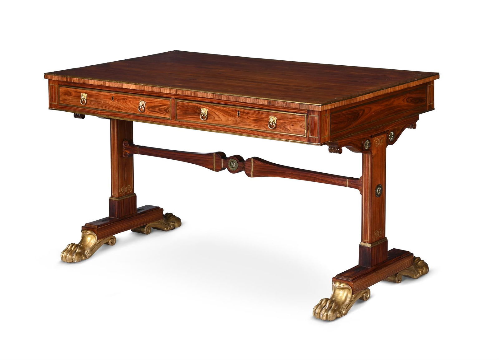 Y A REGENCY PALISANDER, BRASS INLAID AND PARCEL GILT LIBRARY TABLE, IN THE MANNER OF JOHN MCLEAN: Y A REGENCY PALISANDER, BRASS INLAID AND PARCEL GILT LIBRARY TABLEIN THE MANNER OF JOHN MCLEAN, CIRCA 1815The two oak lined frieze drawers opposing false drawers, the carved giltwood paw feet with rec
