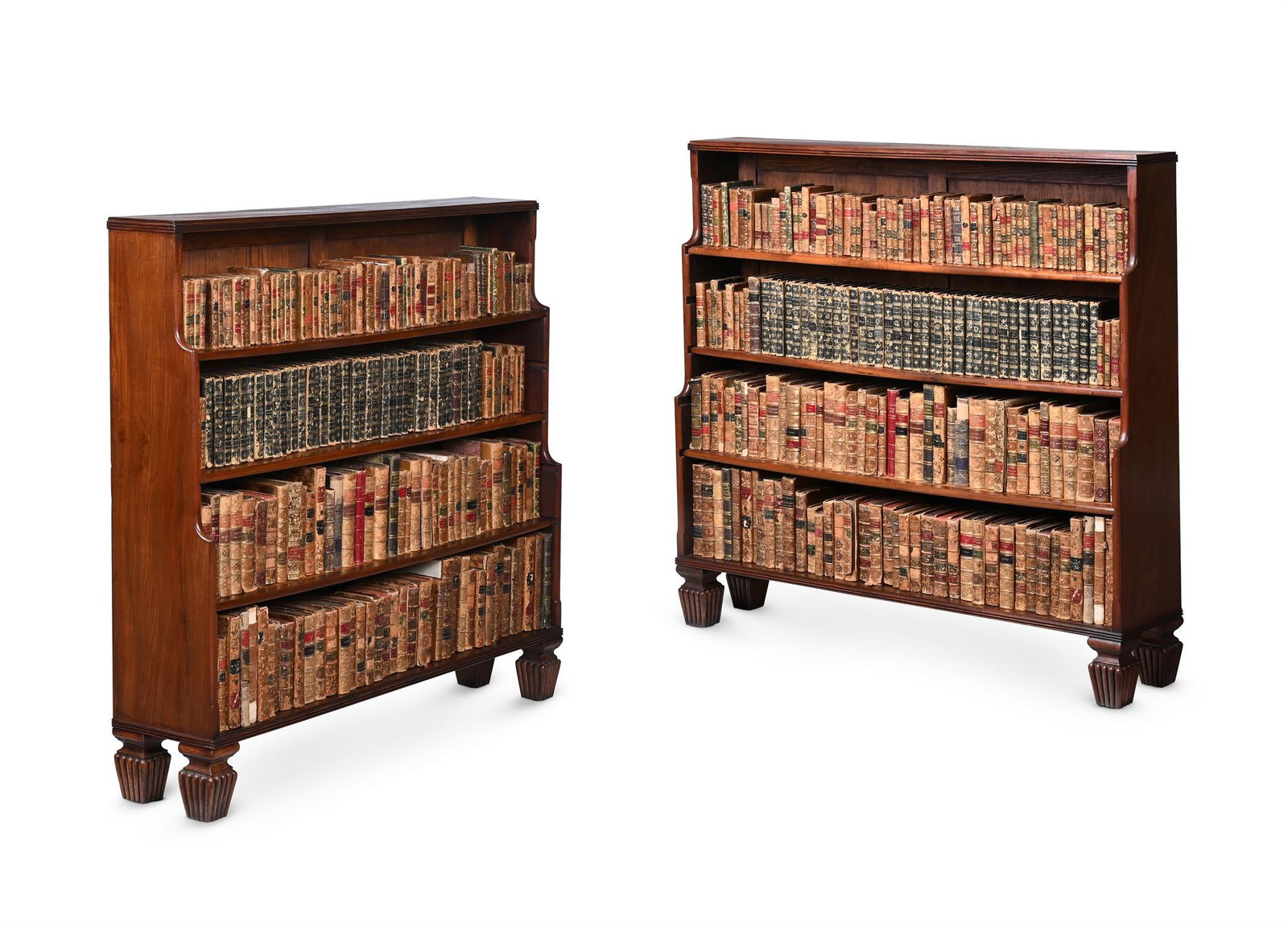 A PAIR OF MAHOGANY WATERFALL OPEN BOOKCASES, IN REGENCY STYLE, INCORPORATING 19TH CENTURY ELEMENTS (1 of 4)