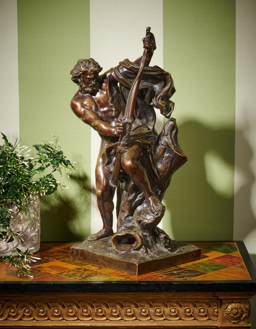 AFTER JACQUES BOUSSEAU (1681-1740), A BRONZE FIGURE OF ULYSSES STRINGING HIS BOW, LATE 19TH CENTURY: AFTER JACQUES BOUSSEAU (1681-1740), A BRONZE FIGURE OF ULYSSES STRINGING HIS BOW LATE 19TH CENTURY 48cm high, the base 19 x 18.5cm