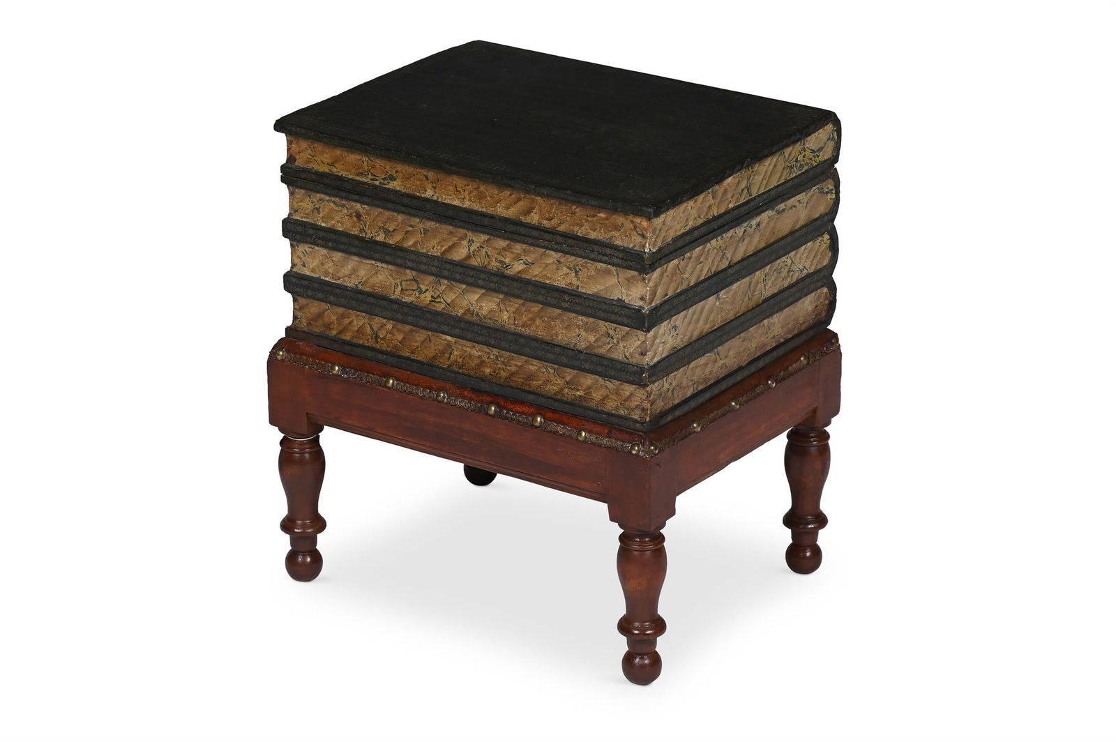 A TOOLED LEATHER, RED PAINTED AND MARBLED PAPER OCCASSIONAL TABLE, LATE 19TH OR 20TH CENTURY: A TOOLED LEATHER, RED PAINTED AND MARBLED PAPER OCCASIONAL TABLELATE 19TH OR 20TH CENTURYFormed as a stack of books, the top hinged to reveal storage and a hinged candle box49cm high, 45.5cm wide, 35.