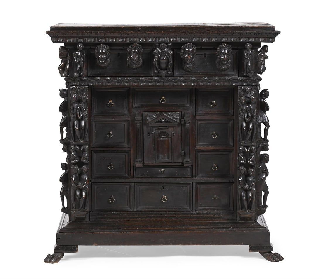 AN ITALIAN CARVED WALNUT TABLE CABINET, EARLY 17TH CENTURY (1 of 2)